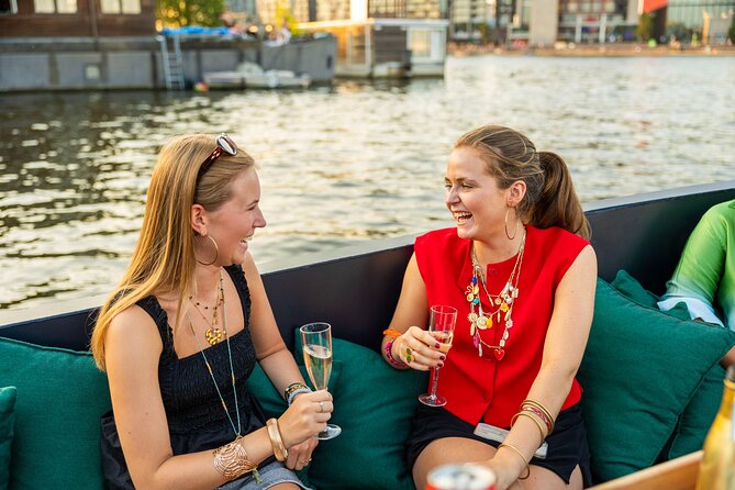 Amsterdam: Guided Open Boat Canal Cruise Unlimited Drinks Option - The Amstel, theaters, and the Magere Brug