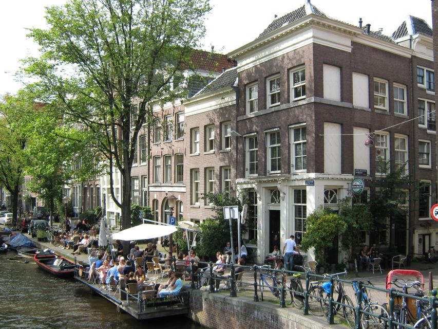 Amsterdam: Guided Sightseeing Bike Tour - Starting with a fitted city bike and local guide