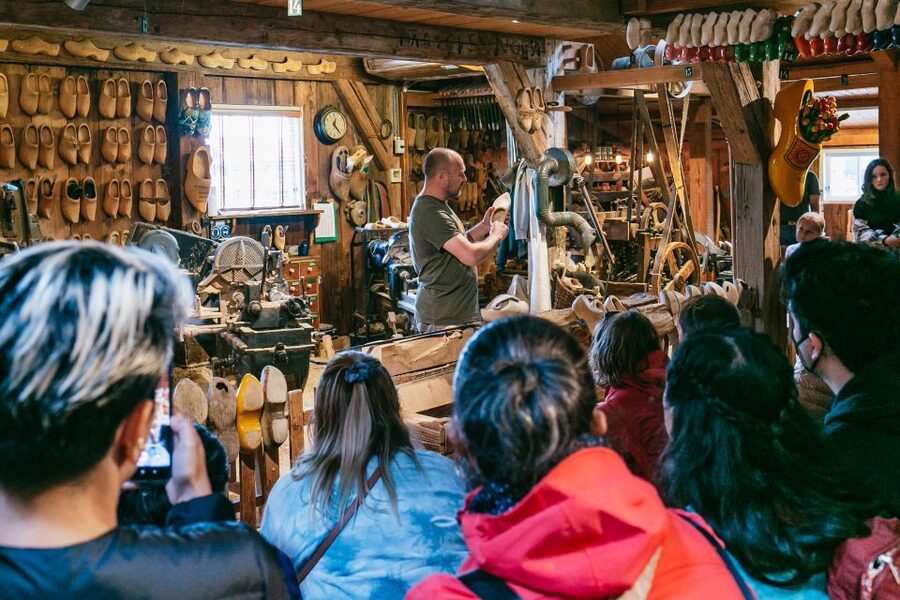 Amsterdam: Guided Zaanse Schans, Windmills & Cheese Tour - Returning to Amsterdam in time for more sightseeing