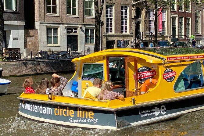 Amsterdam: Historic City Sightseeing Canal Cruise - Canal houses, bridges, and Amsterdam’s old wealth