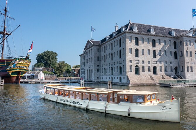 Amsterdam Historic Tour On Classic Saloon Boat - The church, opera house, and changing city views