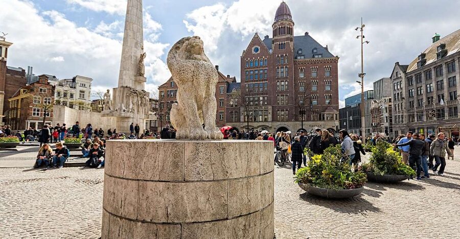 Amsterdam: Historic Walking Tour - Starting at Damrak and the Park Plaza Victoria