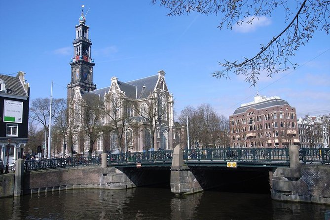 Amsterdam in a Nutshell 4 Hour Private Car Tour and Amsterdam Born Private Guide - Seeing the city’s familiar photo stops