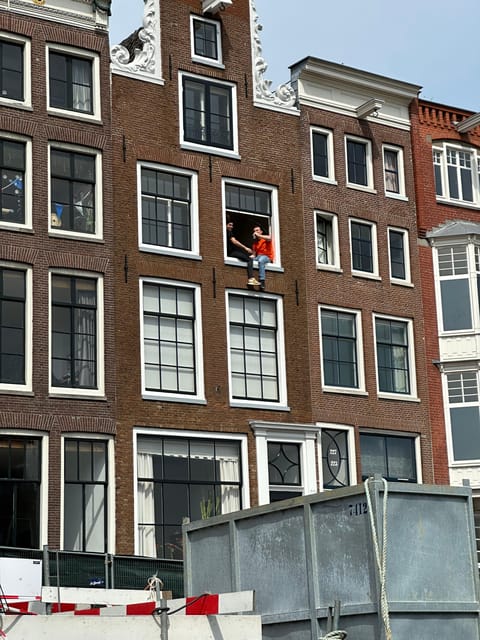 Amsterdam: Kingsday Party Cruise including Drinks - What King’s Day looks like from the Amsterdam canals