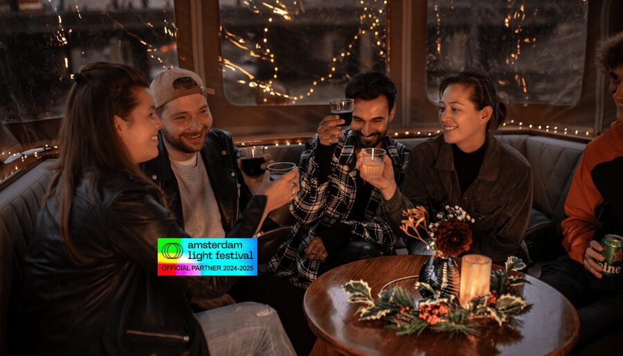 Amsterdam: Light Festival Cruise With Drinks & Snacks - The covered boat and drink choices