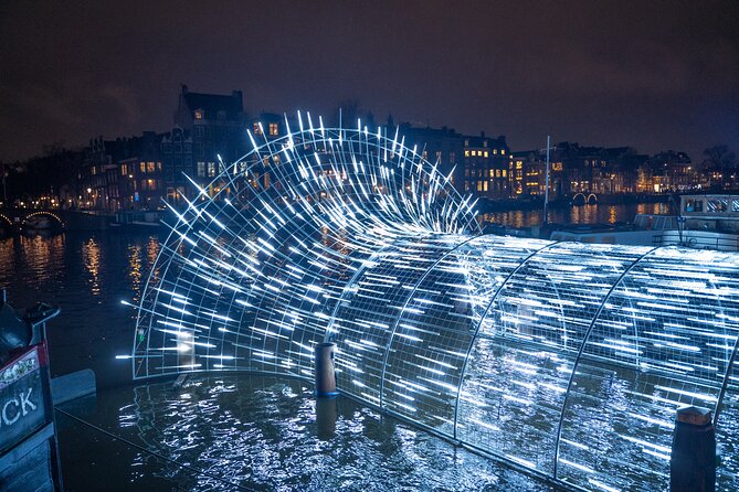 Amsterdam: Light Festival Cruise with Unlimited Drinks Option - Passing NEMO’s bold copper-colored shape