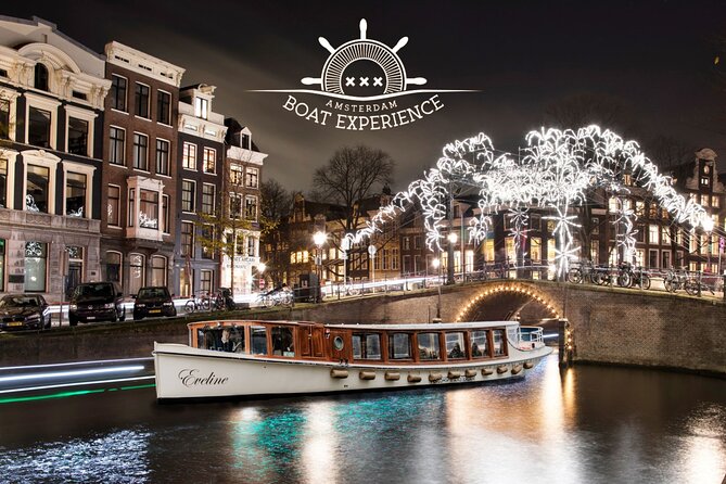 Amsterdam Light Festival: Heated Cruise with Hot Drinks & Bite - The heated cabin helps, but glass changes the view