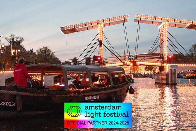 Amsterdam: Light Festival Open Boat - Unl. Drinks Option - The old watchtower and Amsterdam’s odd clock