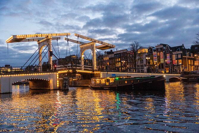 Amsterdam: Light Festival Open Boat - Unl. Drinks Option - The opera house and a famous movable bridge