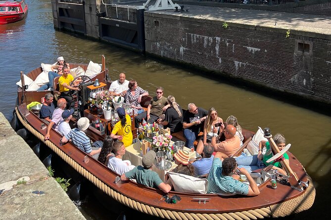 Amsterdam Luxury Boutique Boat tour with Unlimited Beer and Wine - Unlimited drinks and the real price