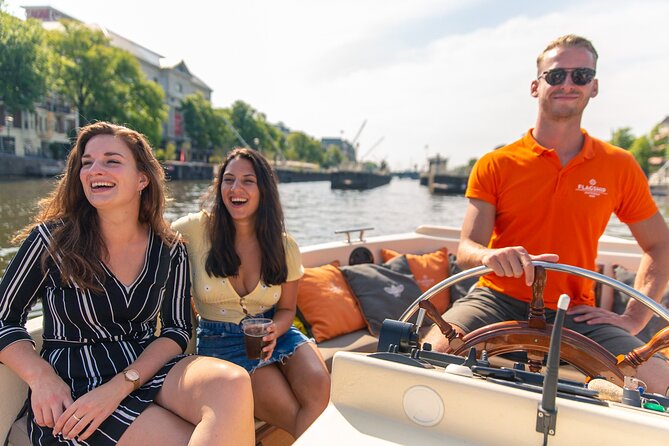 Amsterdam Luxury Canal Cruise + Unlimited Drinks & Bites option - The Anne Frank House and Westerkerk from the water