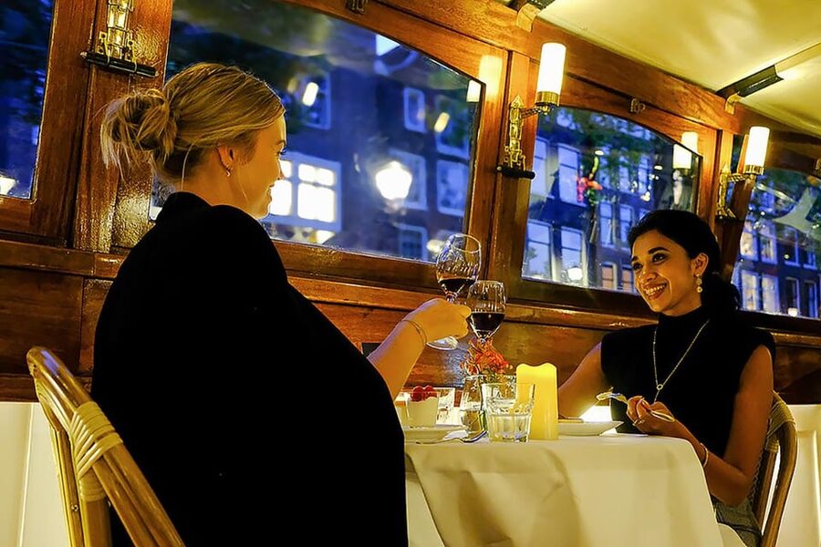 Amsterdam: Luxury Saloon Boat Cruise with 3-Course Dinner - A dinner cruise with Amsterdam scenery built in