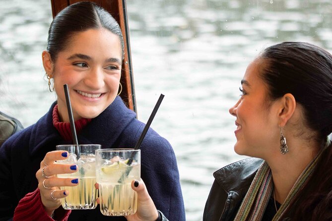 Amsterdam: Luxury Saloon Boat Cruise with Cocktails & Waffle - The locks, bridges, and old waterfront