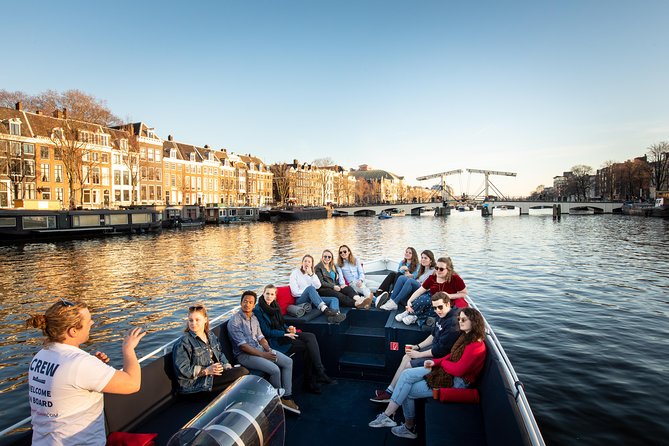 Amsterdam Open Boat Cruise in Old City Center with Live Guide - Drinks included during the one-hour ride