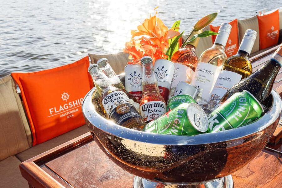 Amsterdam: Open Boat Cruise option Unlimited Drinks & Bite - Seeing Amsterdam from a low, quiet boat