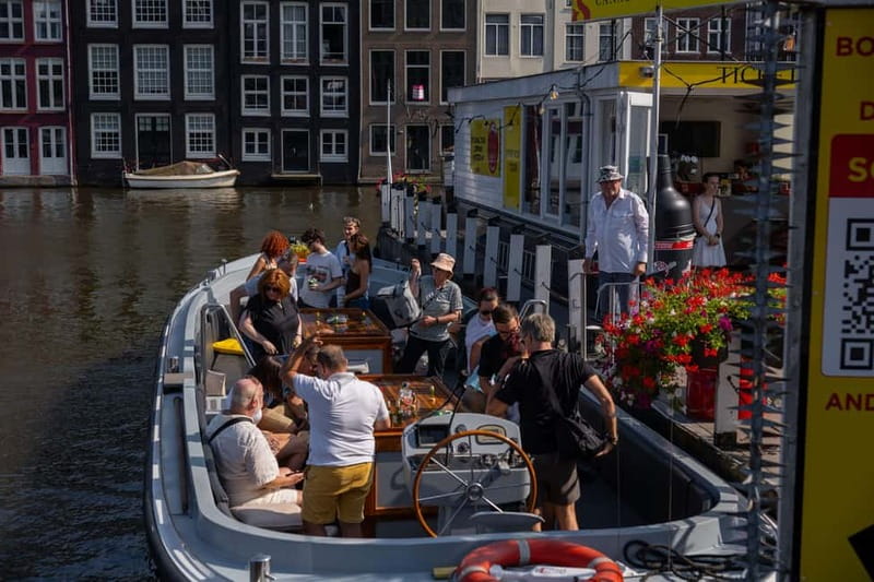 Amsterdam: Open Boat Tour of Canals with Expert Local Guide - Why Amsterdam’s canals are best seen from a small boat
