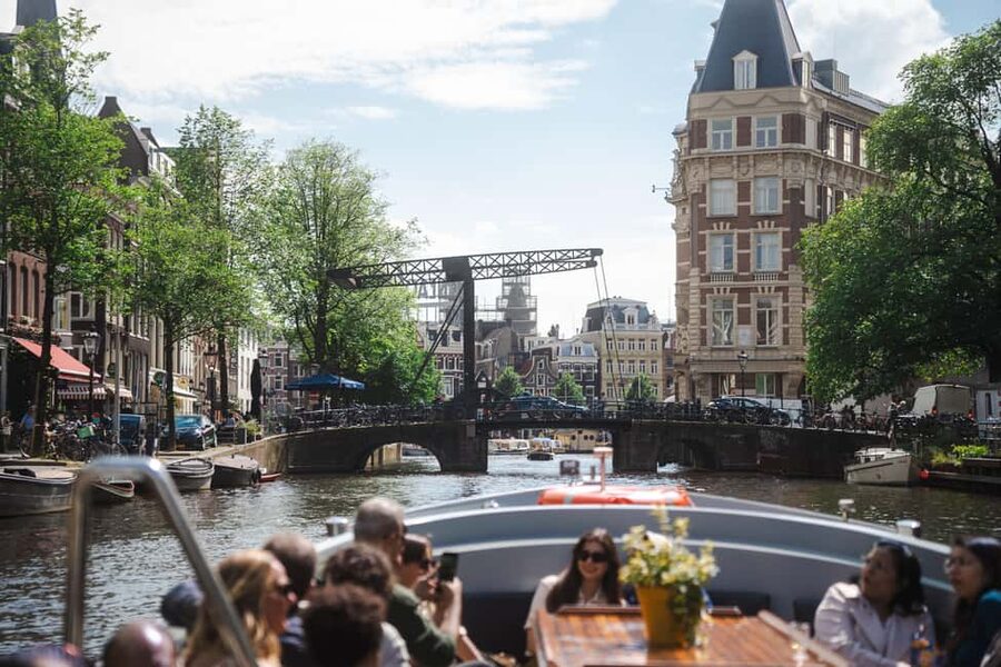 Amsterdam: Open Boat Tour of Canals with Expert Local Guide - Prinsengracht and the quieter side of the route