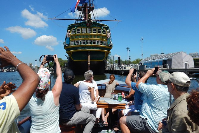 Amsterdam Open Boat Tour with Local Guide - Who should book this canal cruise?