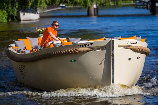 Amsterdam Private BBQ and Drinks Cruise With Onboard Chef - From the floating flower market to NEMO