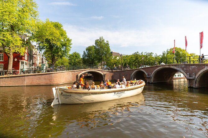 Amsterdam Private Boat Trip with Pizza and Unlimited Drinks - Westerkerk and the city from above