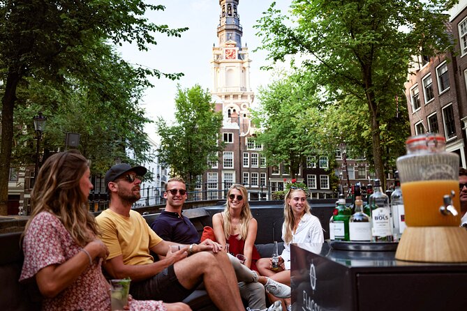 Amsterdam Private Boat Trip with Pizza and Unlimited Drinks - The Flower Market and the Canal Ring