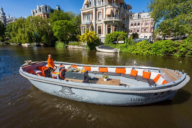 Amsterdam Private Boat Trip With Skipper, Burger and Beers - The Amstel, flower market, and science museum