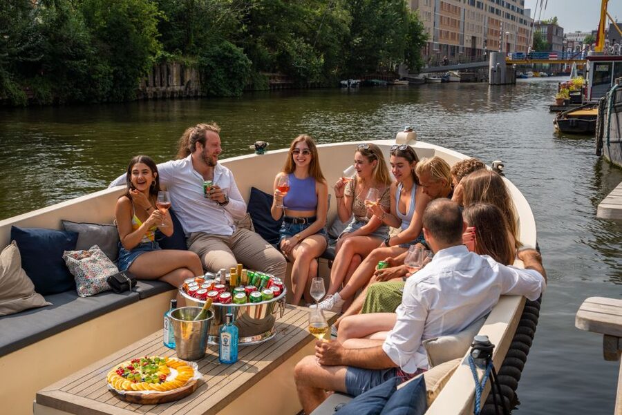 Amsterdam: Private Canal Booze Cruise with Unlimited Drinks - NEMO Science Museum and the eastern waterfront