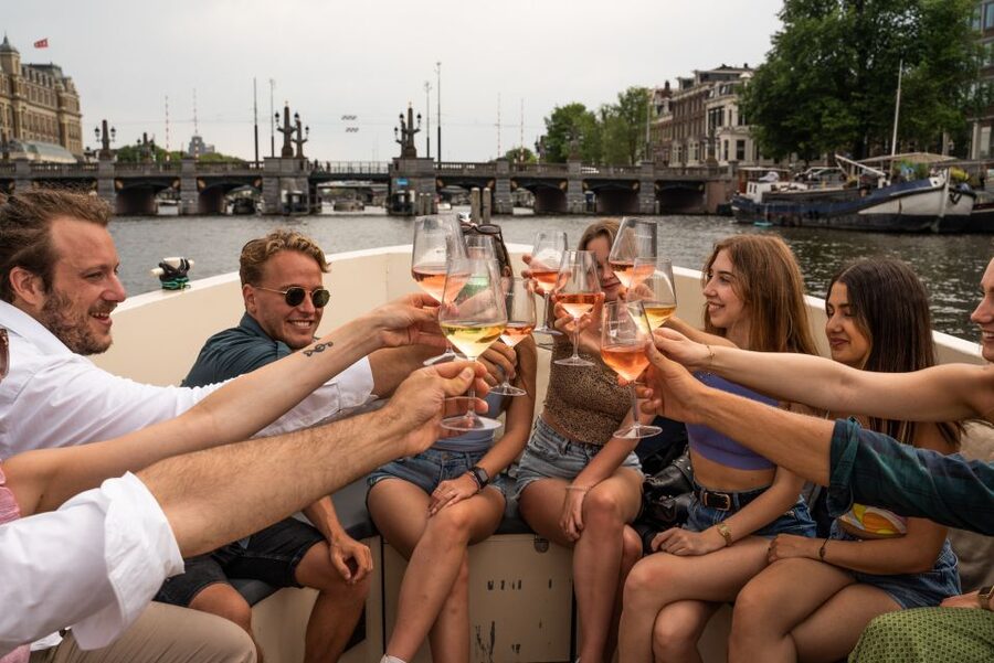 Amsterdam: Private Canal Booze Cruise with Unlimited Drinks - Prinsengracht and Amsterdam’s canal character