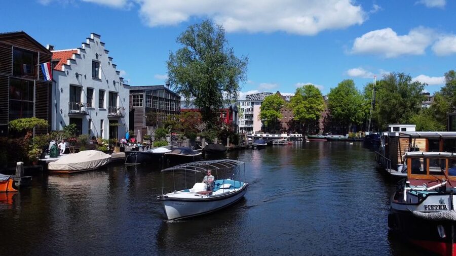 Amsterdam: Private Canal Tour - Why Amsterdam looks different from a small boat