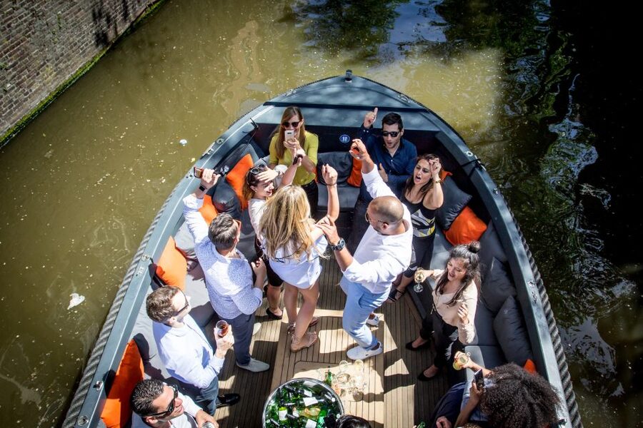 Amsterdam: Private Prosecco Canal Cruise Tour - A Prosecco toast beside Amsterdam Central Station