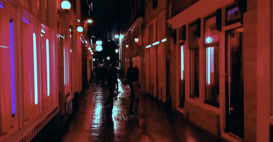 Amsterdam: Private Red Light District Tour in Spanish - Coffeeshops, smart shops, and the meaning of the name