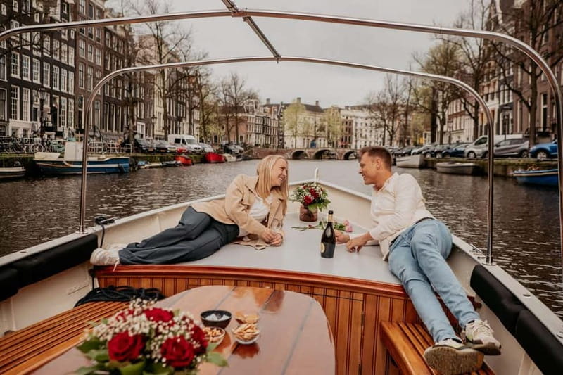Amsterdam: Private Romantic Canal Cruise w. Prosecco/Snacks - The Skinny Bridge and its unusual past