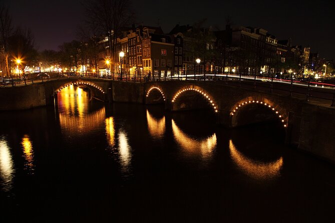 Amsterdam: Private Romantic Evening Canal Cruise + Bubbles/Snacks - Skinny Bridge and Amsterdam after dark