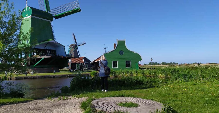Amsterdam: Rainbow Rural Bike Tour With Local Gay Guide - Stopping Beside a Centuries-Old Windmill