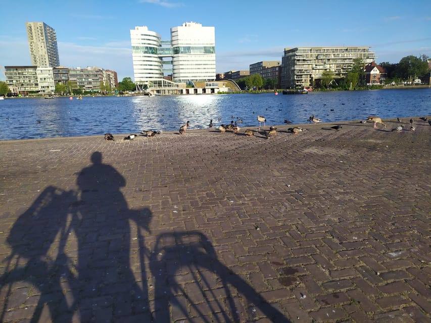 Amsterdam: Rainbow Rural Bike Tour With Local Gay Guide - From Green Fields to the NDSM Harbor