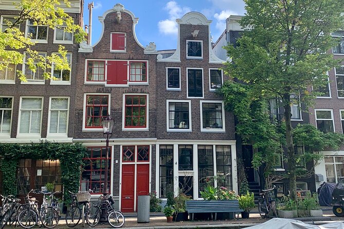 Amsterdam: Red Light District & City Tour (Private tour) - Damrak and direct questions about sex work