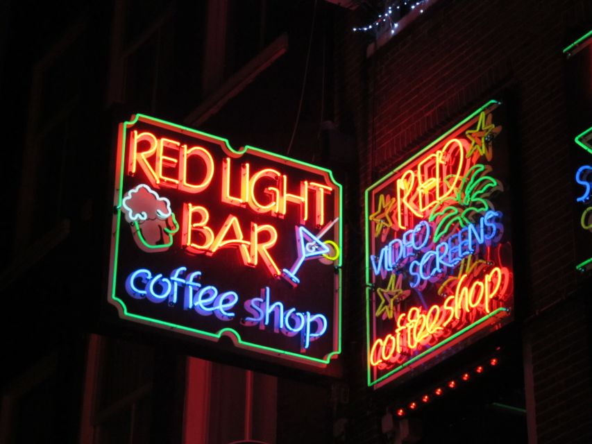 Amsterdam: Red Light District Exclusive Night Tour - The Condomerie, smart shops, and coffeeshop culture