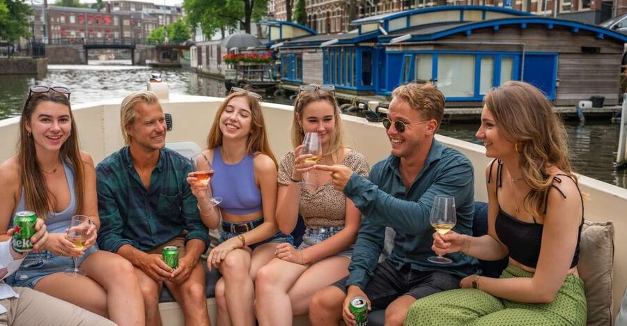 Amsterdam: Red-Light District Pub Crawl and Booze Boat Tour - The short transfer to The Black Tiger Bar