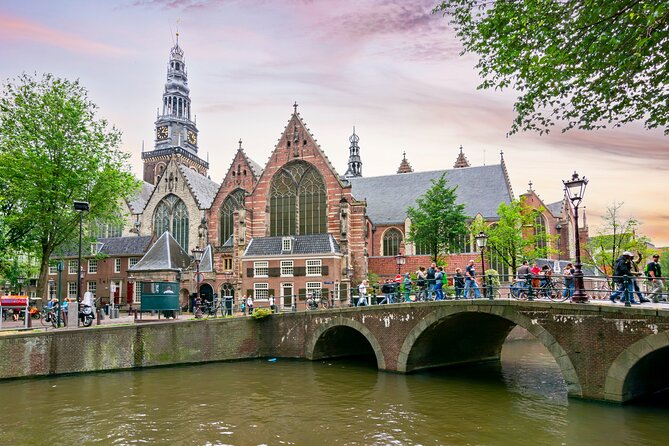 Amsterdam Red Light District Treasure: Self-Guided Tour & Quest - Montelbaanstoren shows Amsterdam as a defended port