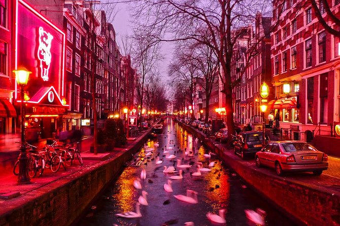 Amsterdam Red Light District Walking Tour in EN/DE/IT/ES - Nieuwmarkt, coffeeshops, and the district’s future