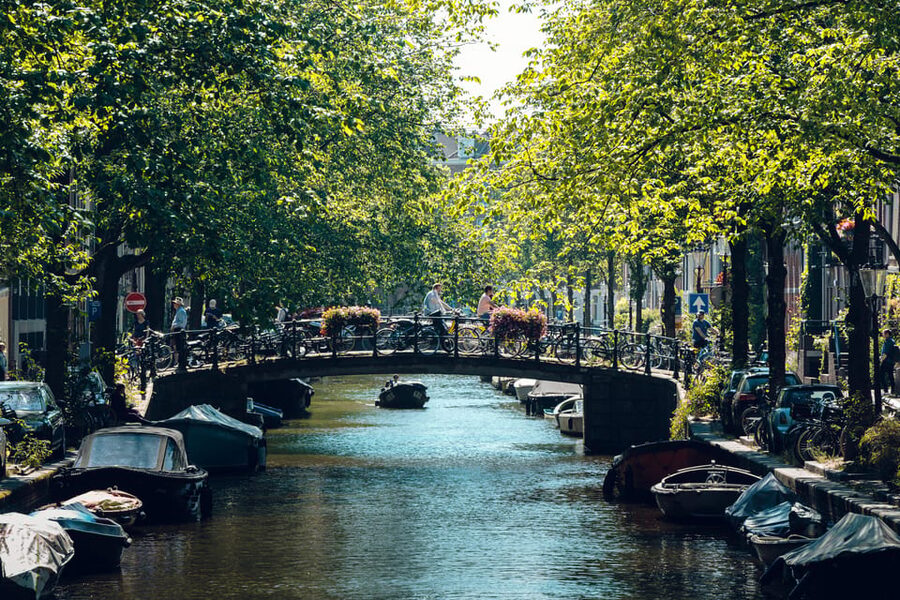 Amsterdam: Relaxed City Highlights Guided Bike Tour - Leidseplein’s music, squats, and nightlife past