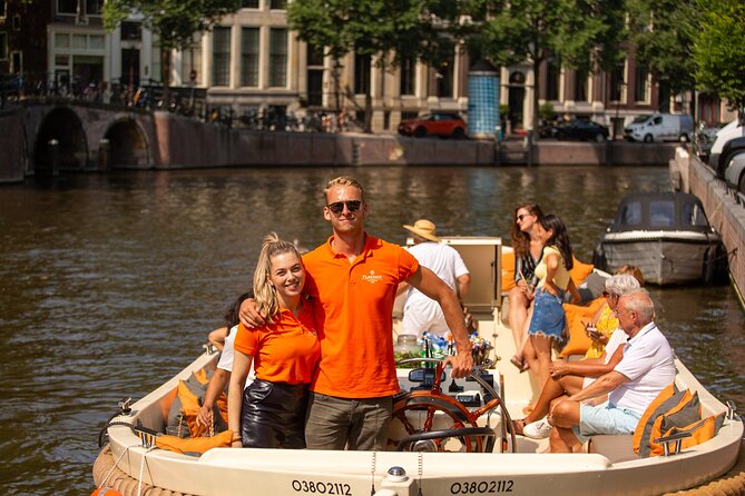 Amsterdam: Saloon Boat Cruise + Unlimited Drinks & Bite option - The Drunken Houses and Amsterdam’s tilted charm