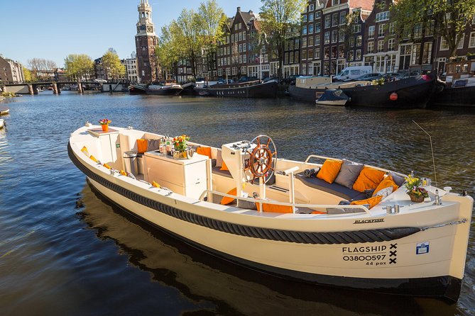 Amsterdam: Saloon Boat Cruise + Unlimited Drinks & Bite option - Drinks, snacks, and the important package distinction