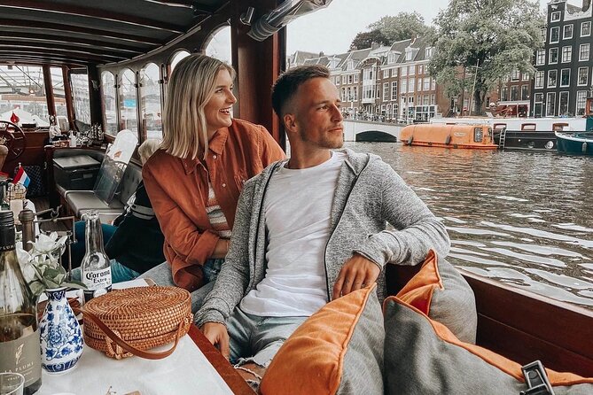 Amsterdam Small-Group Bike Tour With Canal Cruise, Drinks, Cheese - Crossing the Skinny Bridge by bicycle
