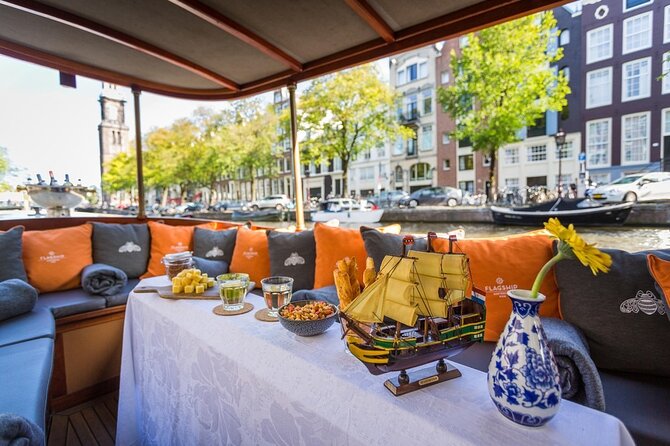 Amsterdam Small-Group Bike Tour With Canal Cruise, Drinks, Cheese - The canal cruise and the handoff to the boat