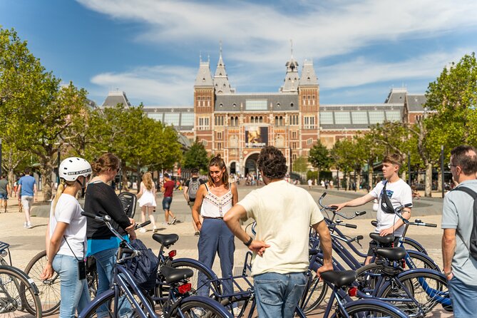 Amsterdam Small-Group Bike Tour With Optional Canal Cruise - What the guides add to the ride