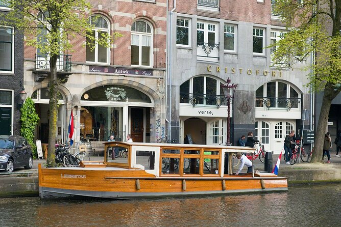 Amsterdam small-group canal cruise in 1920s saloon boat - Following Prinsengracht past Anne Frank House