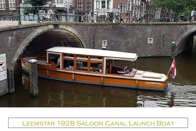 Amsterdam small-group canal cruise in 1920s saloon boat - Warm, covered seating helps on a gray day