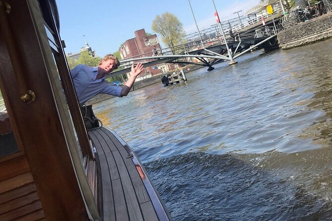 Amsterdam small-group canal cruise in 1920s saloon boat - Herengracht and Keizersgracht show Amsterdam’s grand side