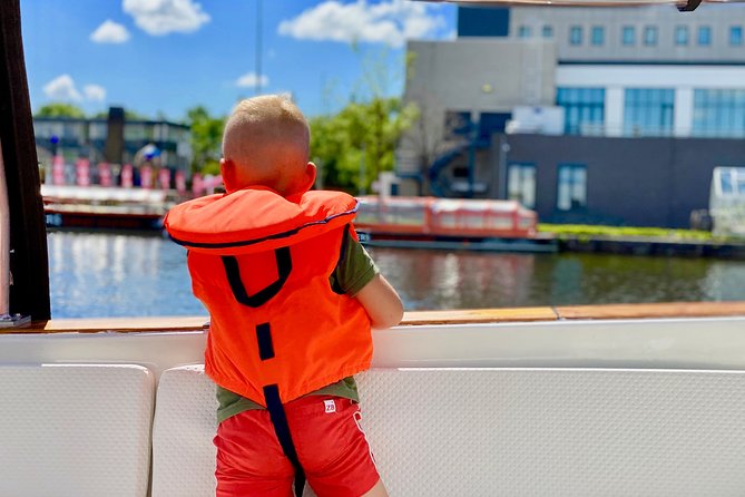 Amsterdam Small-Group Canal Cruise Including Snacks and Drinks - From the Amstel to the Red Light District